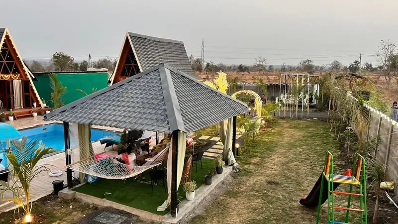 Dining gazebo with hammock on the lawn